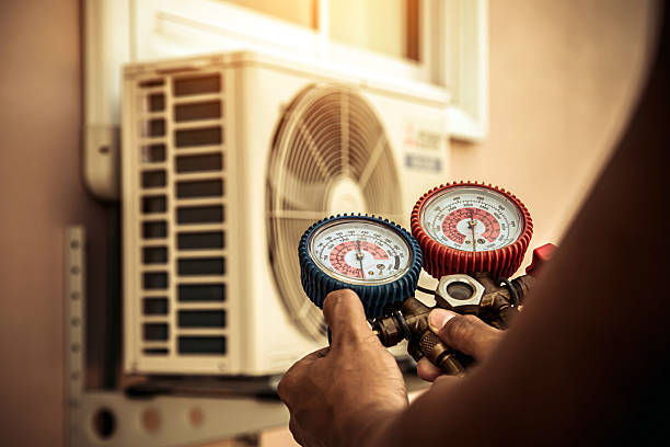Professional Air Conditioning Service technician working in Burlington, WI